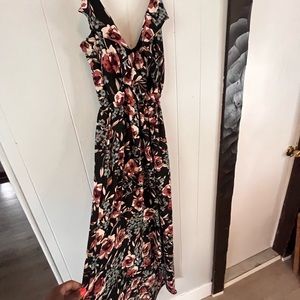Summer floral dress with ruffles and belt. Short in the front, long in the back.